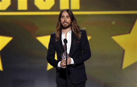 Actor Jared Leto accepts the award for best supporting actor for "Dallas Buyers Club" during the 19th annual Critics' Choice Movie Awards in Santa Monica, California January 16, 2014. REUTERS/Mario Anzuoni