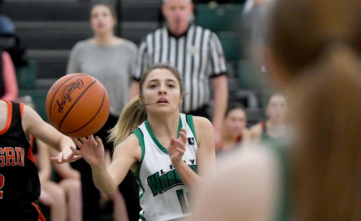 West Branch's Chloe Dennison makes a pass in the first half against Chagrin Falls in OHSAA Division II District Semifinals at Nordonia High School. Wednesday, February 28, 2024.