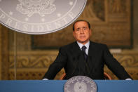 <p>Il momento peggiore sotto Berlusconi: lo spread passò da 37 a 520 prima delle dimissioni e del passaggio al governo tecnico di Monti. Quota record toccata? 574 punti (foto: LaPresse) </p>