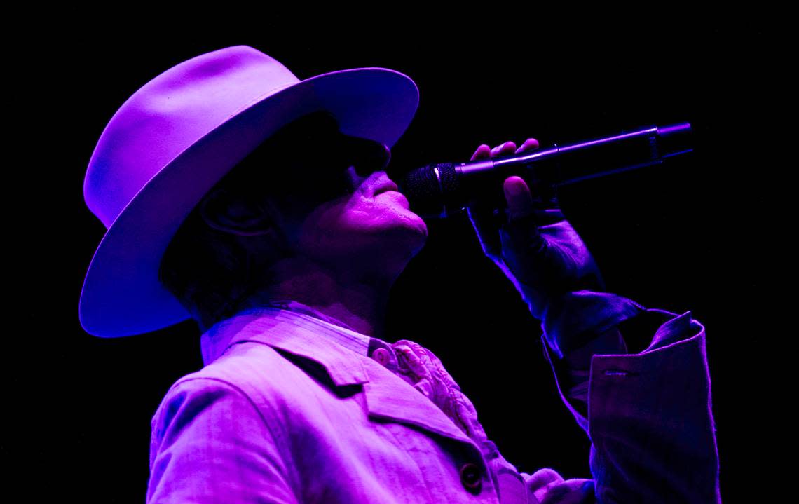 Jane’s Addiction lead singer Perry Farrell opens the show bathed in blue light at Raleigh, N.C.’s Red Hat Amphitheater, Tuesday night, Sept. 3, 2024.