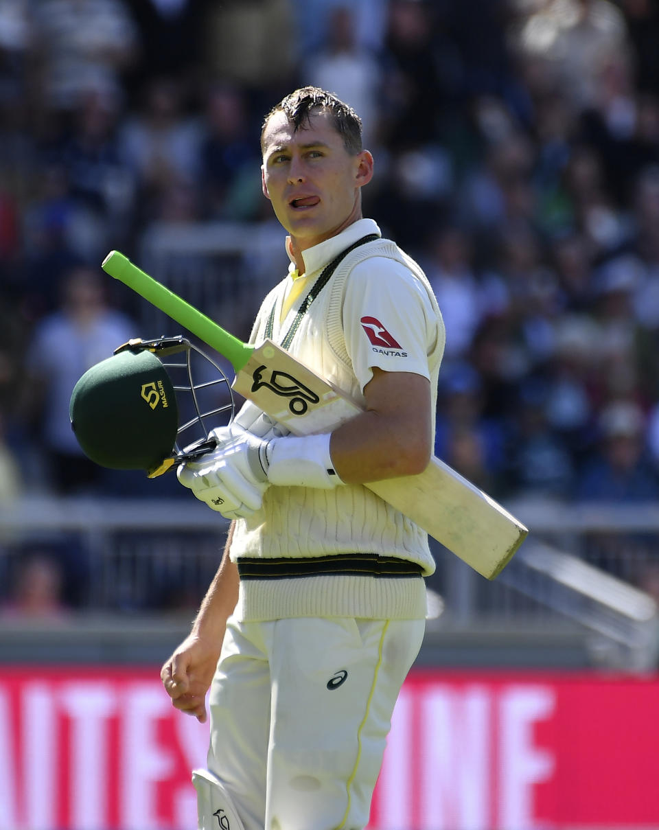 Australia's Marnus Labuschagne reacts as he walks off the field after losing his wicket during the first day of the fourth Ashes cricket Test match between England and Australia at Old Trafford in Manchester, England, Wednesday, July 19, 2023. (AP Photo/Rui Vieira)