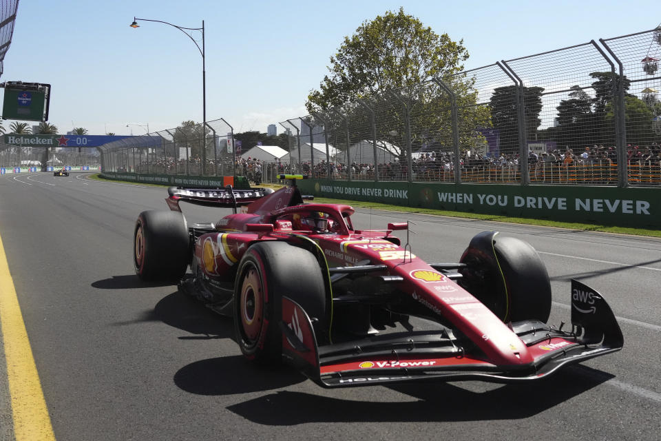 Ferrari driver Carlos Sainz of Spain steers his car during the first practice session of the Australian Formula One Grand Prix at Albert Park, in Melbourne, Australia, Friday, March 22, 2024. (AP Photo/Scott Barbour)