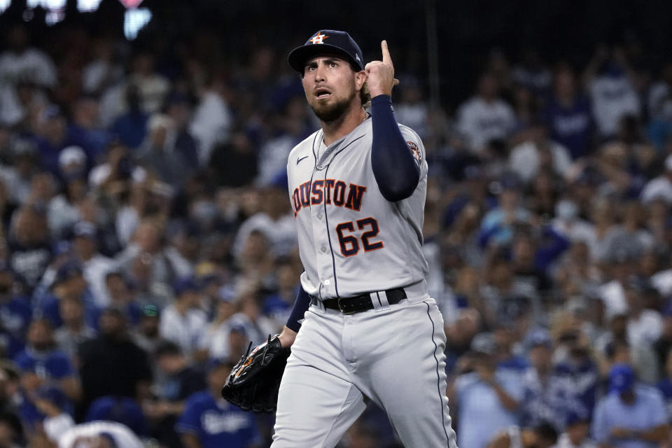 Houston Astros reliever Blake Taylor reacts after striking out Los Angeles Dodgers' Max Muncy to end the seventh inning of a baseball game Tuesday, Aug. 3, 2021, in Los Angeles. (AP Photo/Marcio Jose Sanchez)