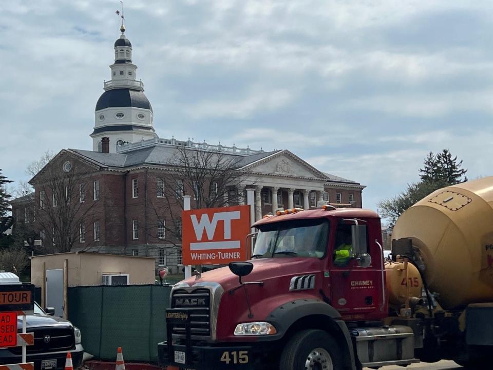 A Mack truck works in front of the State House in Annapolis on March 31, 2023. Parts of Mack trucks are manufactured in Hagerstown, Maryland, at the Volvo plant, the state’s lone auto manufacturer.