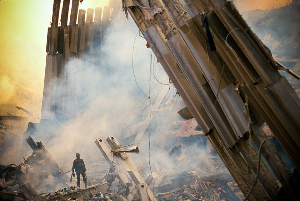 The rubble of the World Trade Center smolders following a terrorist attack on Sept. 11, 2001, in New York