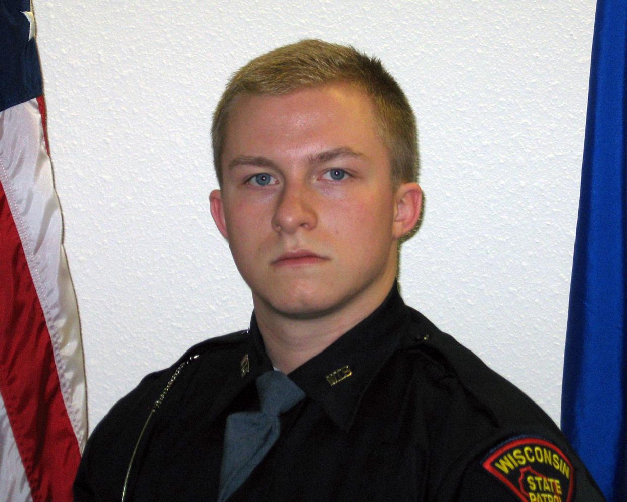In this photo provided by Wisconsin Department of Transportation/Division of State Patrol is Wisconsin State Patrol trooper Trevor Casper, 21. Casper,  just three months out of the academy and working his "dream job," died Tuesday, March 24, 2015 in a shootout with a bank robbery suspect also believed to have killed another motorist in Fond Du Lac, Wis