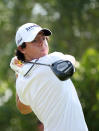 ABU DHABI, UNITED ARAB EMIRATES - JANUARY 28: Rory McIlroy of Northern Ireland hits a tee shot during the third round of The Abu Dhabi HSBC Golf Championship at Abu Dhabi Golf Club on January 28, 2012 in Abu Dhabi, United Arab Emirates. (Photo by Andrew Redington/Getty Images)