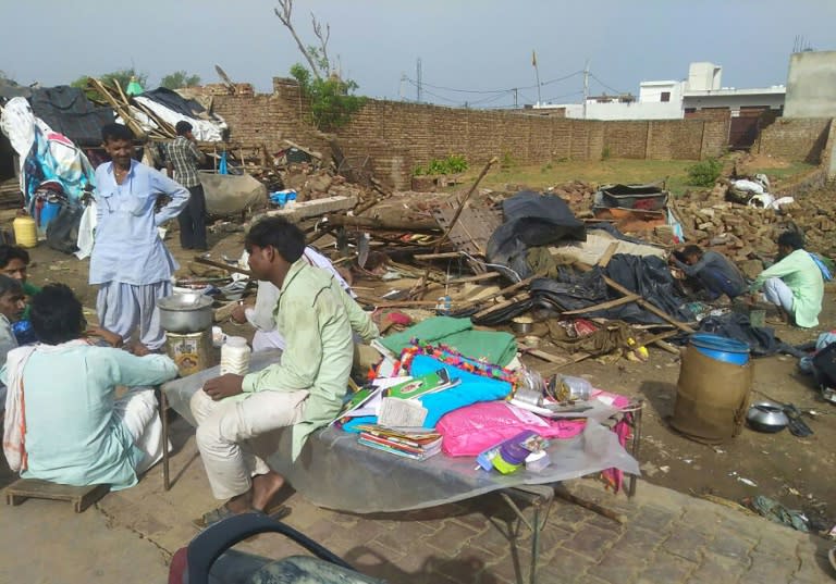 The storm flattened homes and toppled electricity pylons in Rajasthan