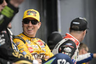 Kyle Busch smiles prior to a NASCAR Cup Series auto race at Charlotte Motor Speedway, Sunday, Oct. 9, 2022, in Concord, N.C. (AP Photo/Matt Kelley)