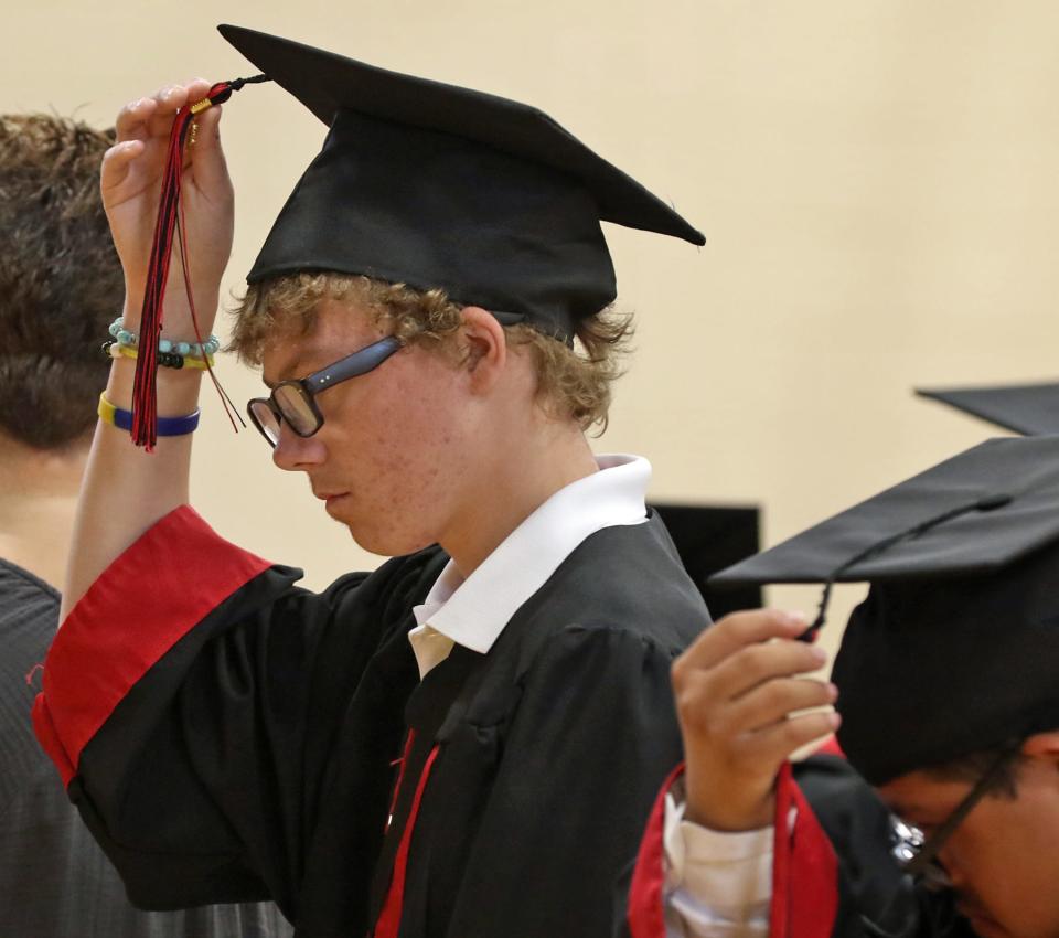 Hunter McDaniel turns his tassel during the North Shelby Graduation Ceremony held Thursday morning, May 11, 2023, in the gym at North Shelby School.