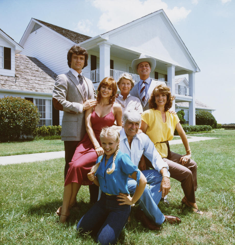 <em>Dallas</em> star Larry Hagman, back right, and the rest of the cast film at Southfork in 1979. (Photo: Copyright CBS Broadcasting Inc.)