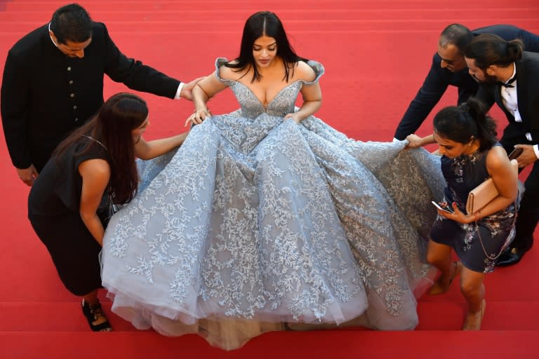 Bollywood actress Aishwarya Rai Bachchan needed a team of five to help her up the stairs at Cannes