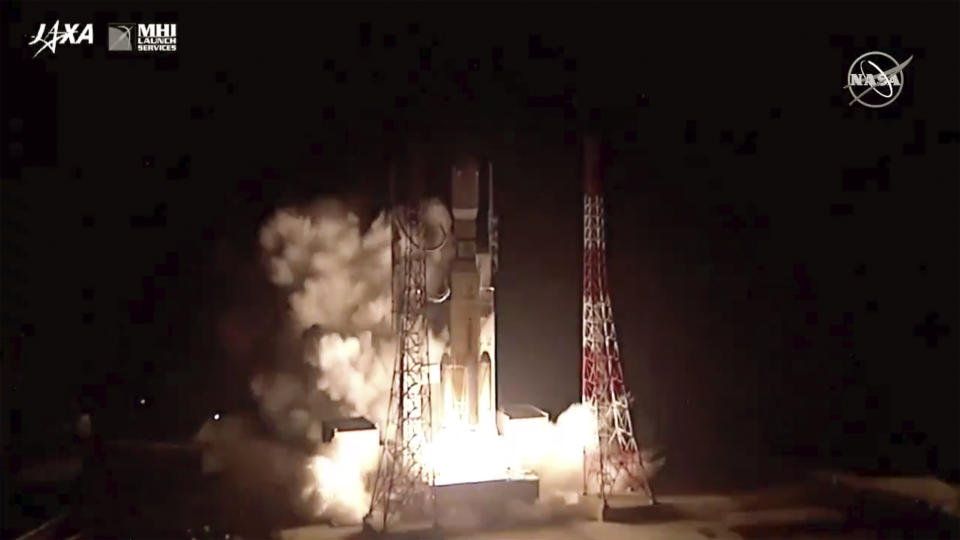 This photo provided by NASA shows a unmanned rocket carrying the Japan Aerospace Exploration Agency's supply vessel is launched off from Tanegashima Space Center in southern Japan on Tuesday, Sept. 24, 2019. The spacecraft is loaded with more than four tons of supplies, spare parts, and experiment hardware is headed to the International Space Station. (NASA via AP)