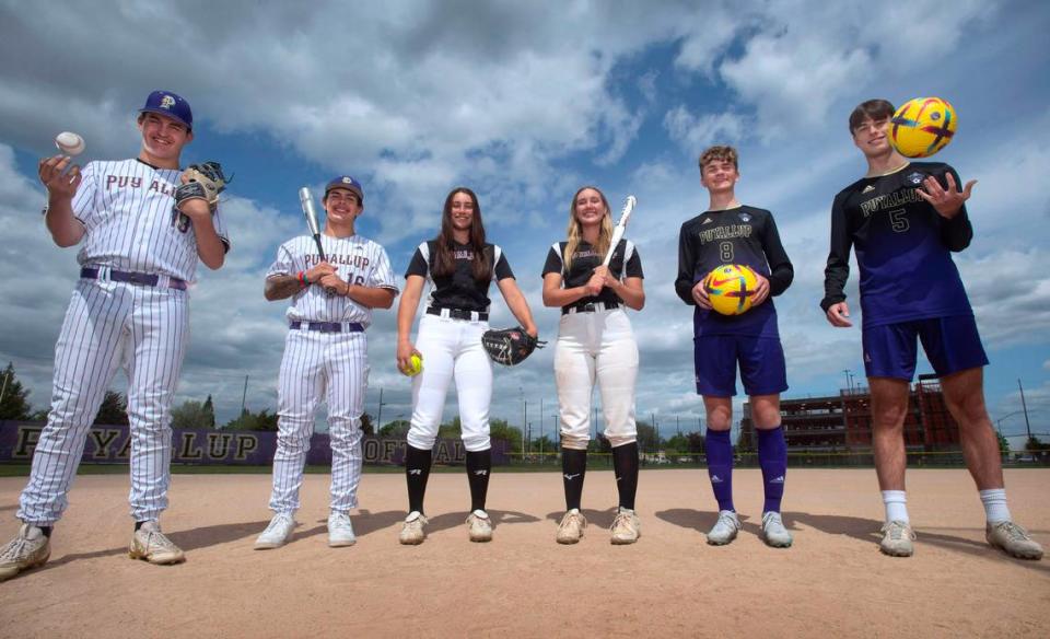 Puyallup baseball pitcher Hunter Grasser and catcher Kai Halstead, softball pitcher Lauryn Krick and third baseman Kyra Smith, and soccer midfielder Dean Williams and defender Brady Anderson will take their Vikings teams into this weekend’s state playoffs. They are shown at Puyallup High School in Puyallup, Washington, on Tuesday, May 23, 2023.