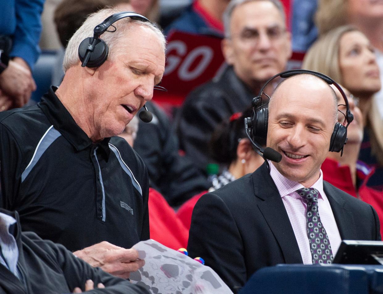 Pac-12 basketball analysts Bill Walton (left) and Dave Pasch (right) look on as the Arizona Wildcats play the Washington Huskies during the first half at McKale Center on Feb. 7, 2019.