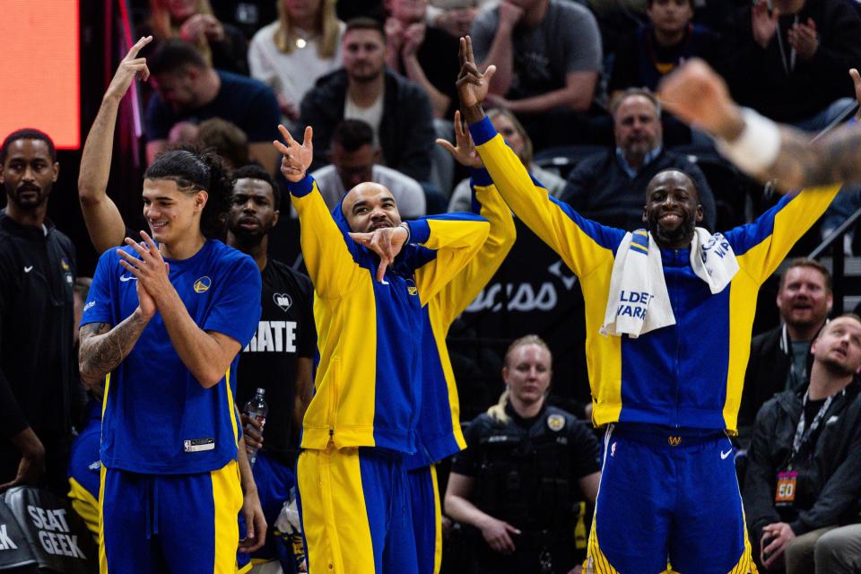 Golden State Warriors players celebrate from the bench after a 3-point basket during the NBA basketball game between the Utah Jazz and the Golden State Warriors at the Delta Center in Salt Lake City on Thursday, Feb. 15, 2024. | Megan Nielsen, Deseret News