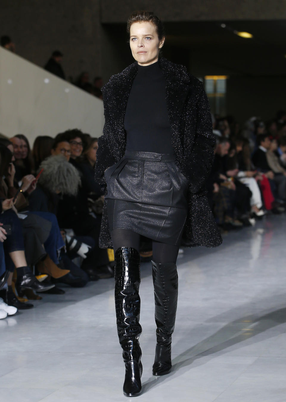 Model Eva Herzigova wears a creation as part of the Max Mara women's Fall-Winter 2019-20 collection, unveiled during the Fashion Week in Milan, Italy, Thursday, Feb. 21, 2019. (AP Photo/Antonio Calanni)