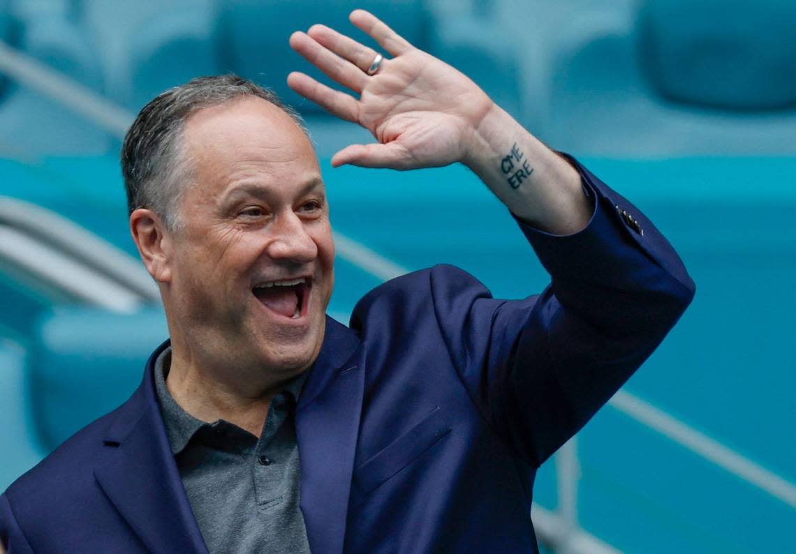 Second Gentleman Douglas Emhoff waves towards attendees as they arrive for the Miami Open Tennis Tournament at Hard Rock Stadium in Miami Gardens, Florida on Wednesday, March 27, 2024.