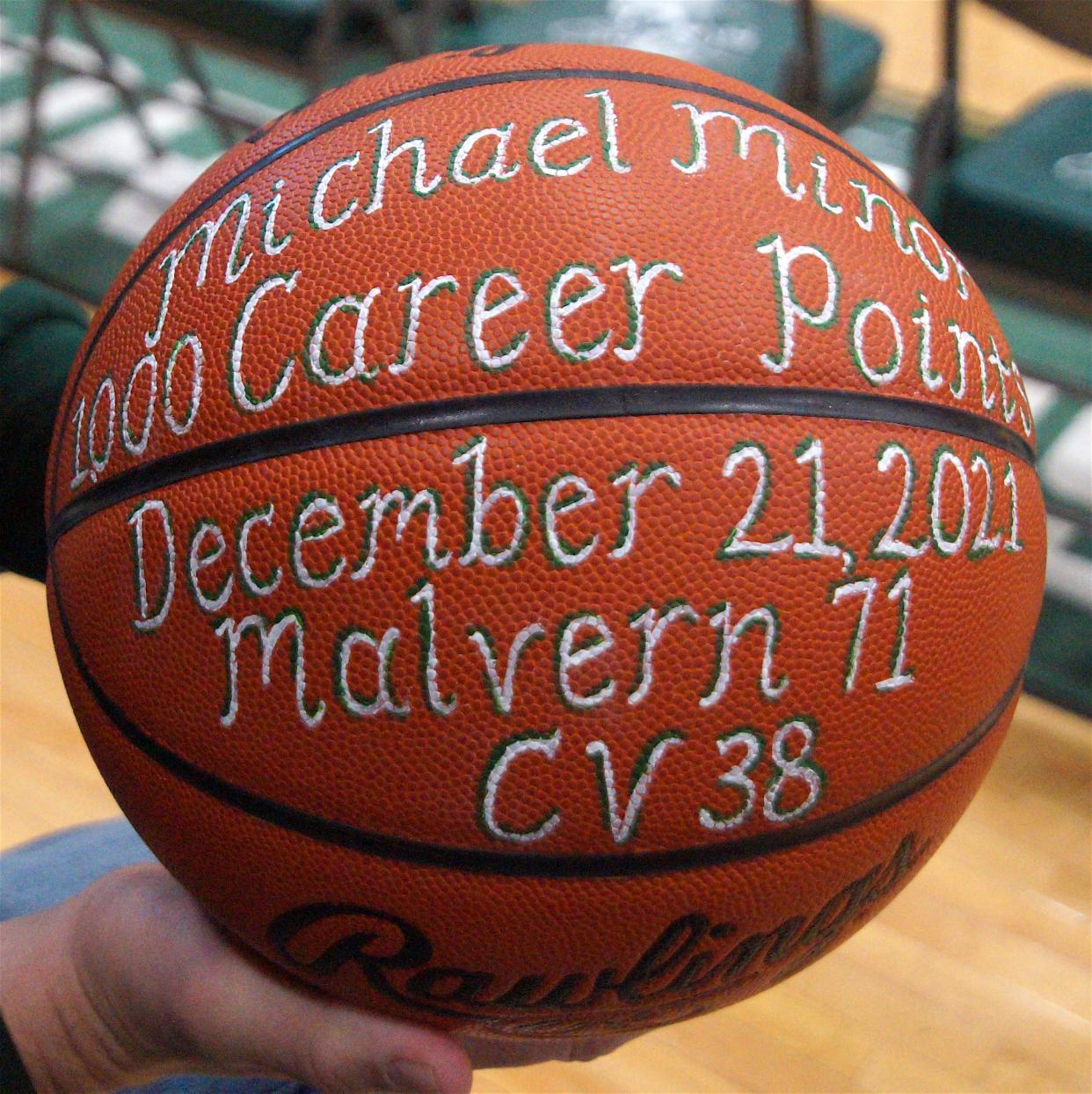 The ball presented to Michael Minor celebrating his 1,000th point.