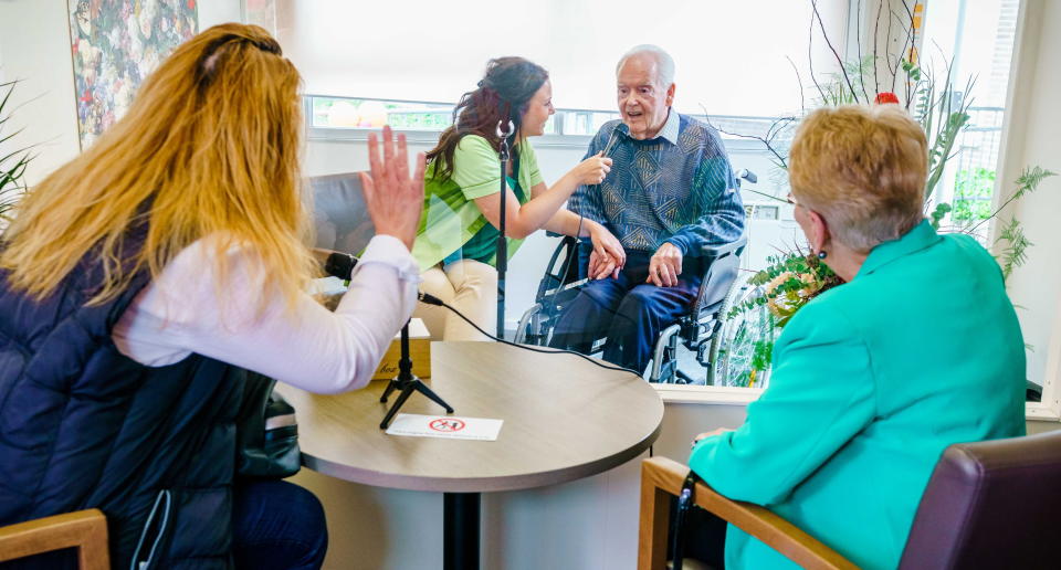 Relative visit at an aged care home via a screen. Source: AAP