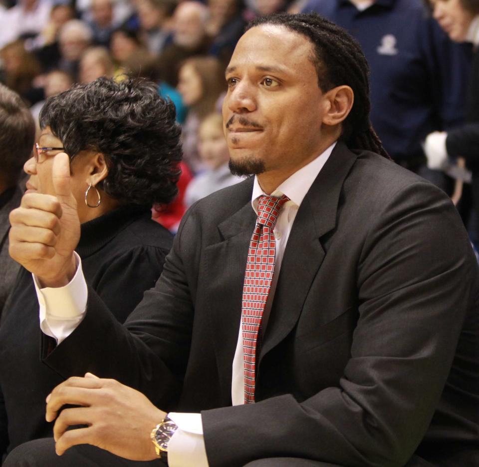 Former Xavier University men's basketball player Brian Grant, pictured here at Cintas Center watching Xavier defeat Temple on Jan. 22, 2011, recently published a book about his life, titled "Rebound: Soaring in the NBA, Battling Parkinson's, and Finding What Really Matters."