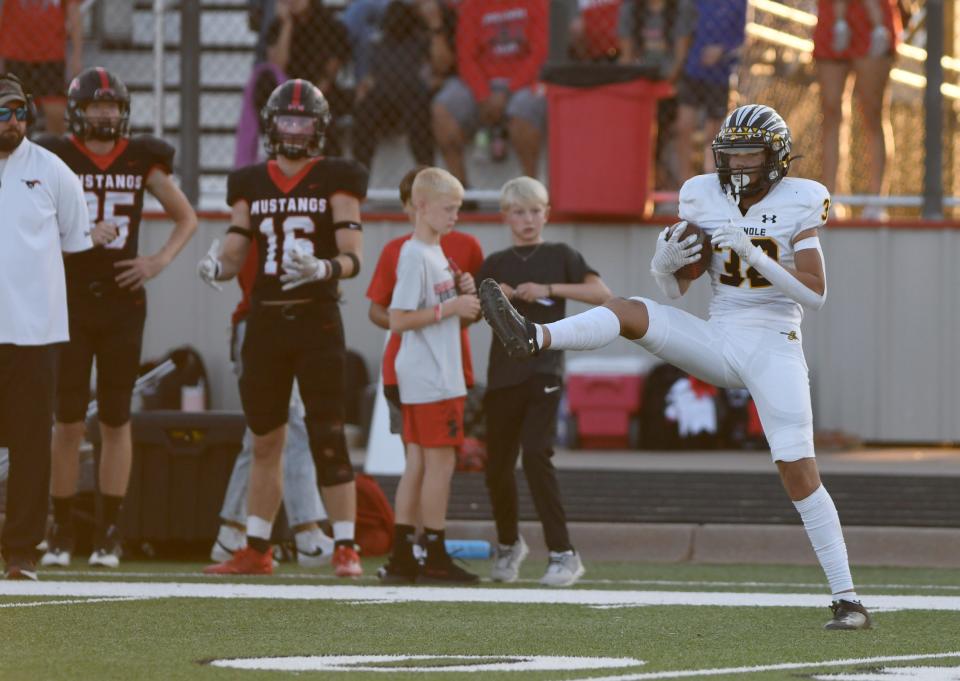 Seminole's Austin Olivas intercepts the ball against Shallowater in a non-district football game, Friday, Sept. 1, 2023, at Todd Field in Shallowater.