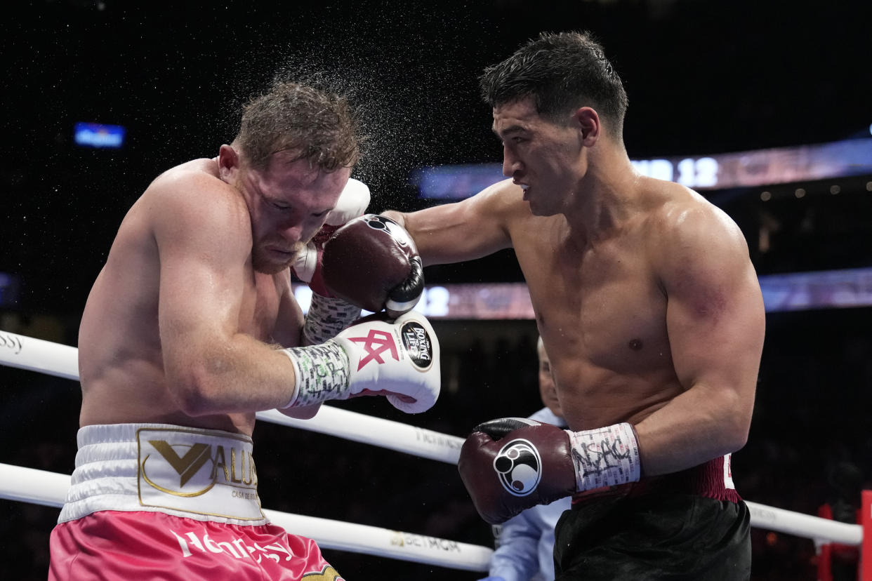 Dmitry Bivol repeatedly landed hard shots on Canelo Alvarez, who lost for only the second time in his career Saturday at T-Mobile Arena in Las Vegas. (AP Photo/John Locher)