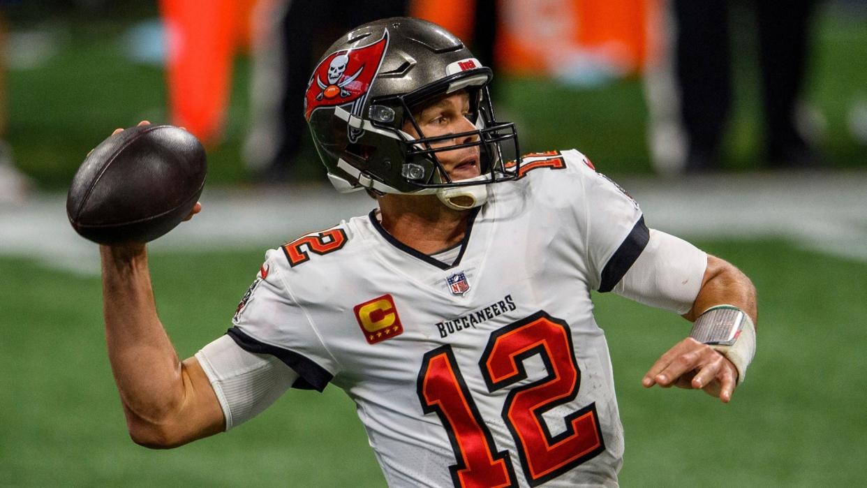 Mandatory Credit: Photo by Danny Karnik/AP/Shutterstock (11659105lr)Tampa Bay Buccaneers quarterback Tom Brady (12) works during the second half of an NFL football game against the Atlanta Falcons, in Atlanta.