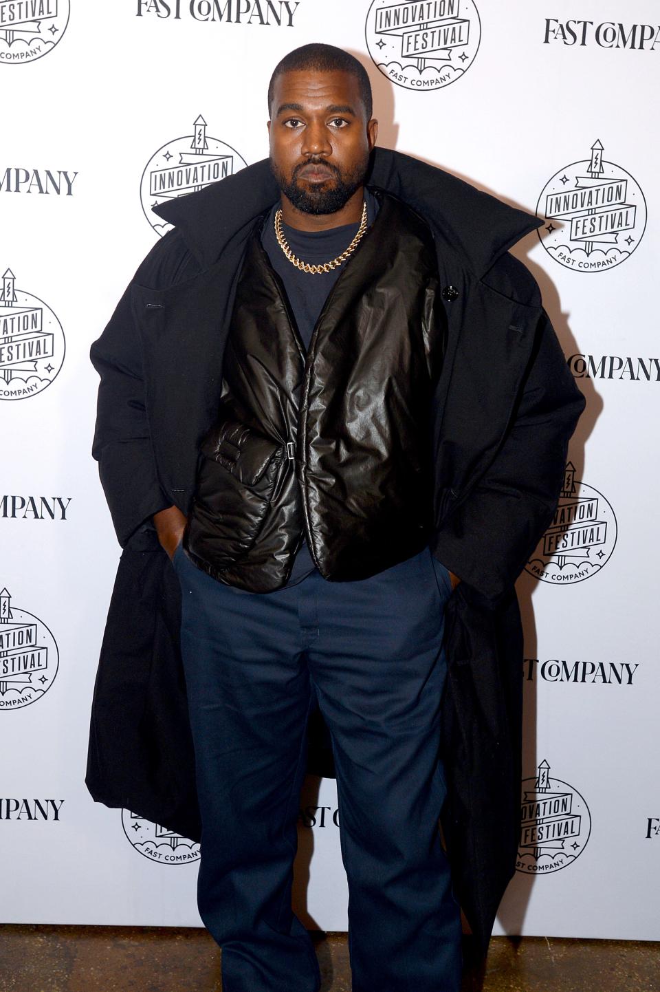 Kanye West looks adorable as he sports a blue jack with inner-wear and pant to match