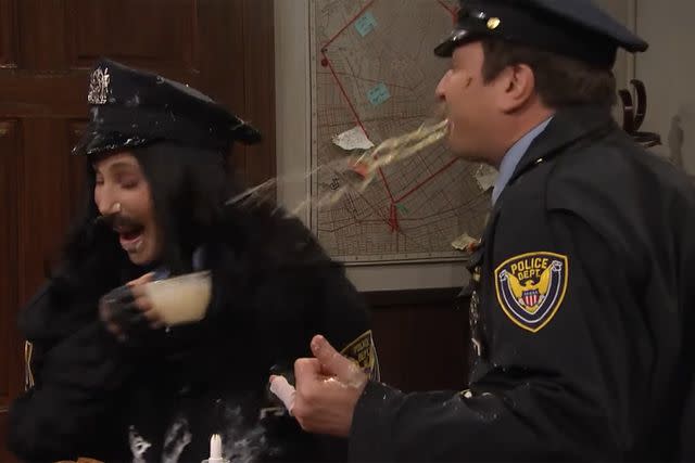 <p>The Tonight Show Starring Jimmy Fallon/Youtube</p> Cher and host Jimmy Fallon during "Point Pleasant Police Department" sketch on 'The Tonight Show'