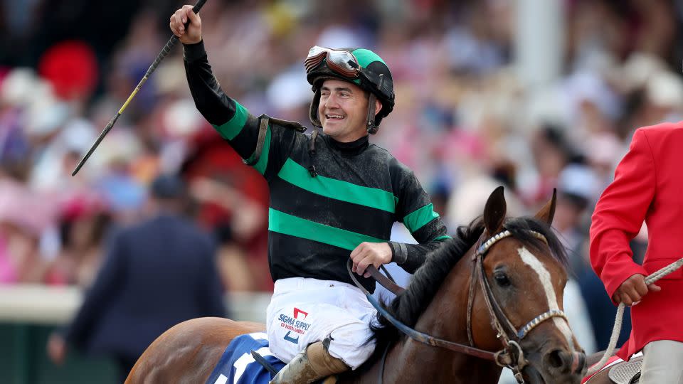 Jockey Brian Hernandez Jr. on top of Mystik Dan celebrates after winning - Rob Carr/Getty Images