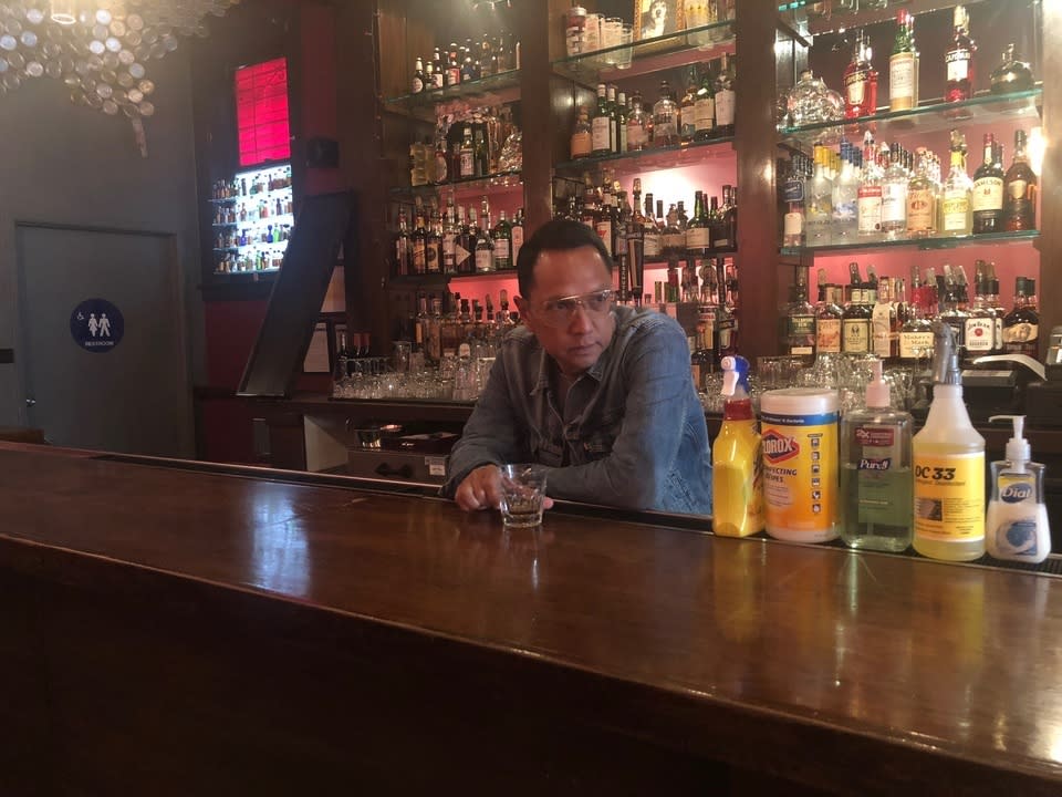 John Ordoña behind the bar at Mini Bar.