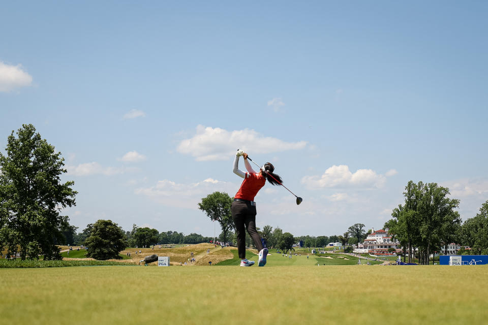 Jun 26, 2022; Bethesda, Maryland, USA; Atthaya Thitikul plays her shot from the 15th tee during the final round of the KPMG Women's PGA Championship golf tournament at Congressional Country Club. Mandatory Credit: Scott Taetsch-USA TODAY Sports