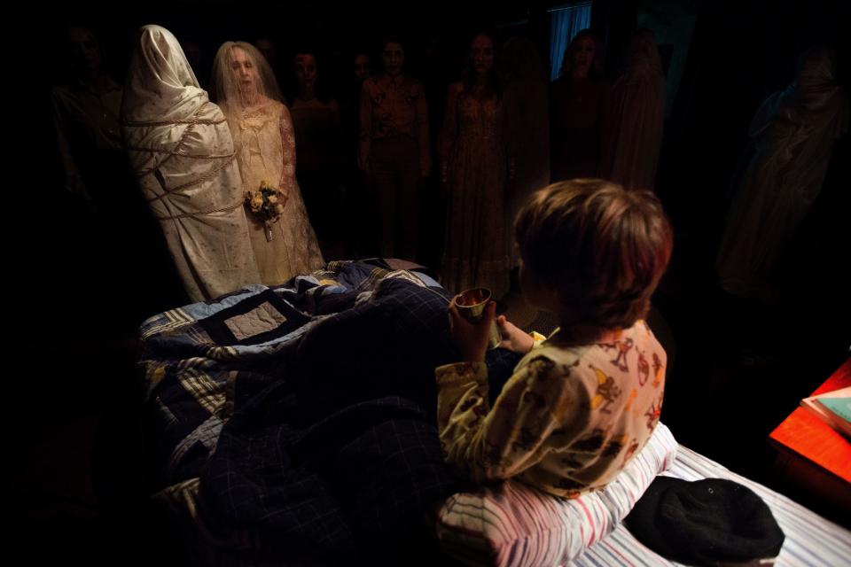 A young boy notices a series of ghosts standing around his bed at night