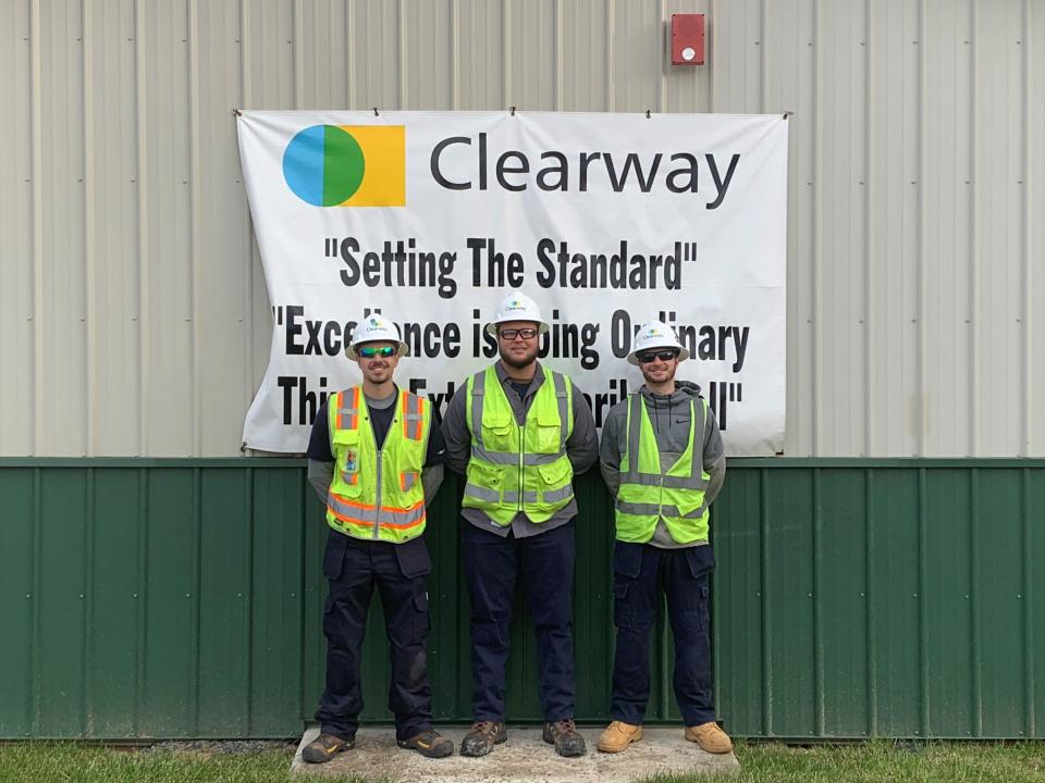 Logan Reel, Austin Locklear and Ian Guckavan are pictured at Clearway's Block Rock wind farm.