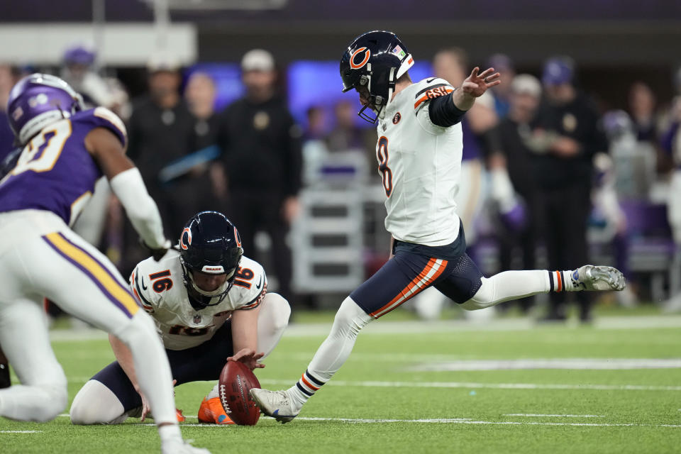 Chicago Bears place-kicker Cairo Santos (8) kicks a 39-yard field goal during the second half of an NFL football game against the Minnesota Vikings, Monday, Nov. 27, 2023, in Minneapolis. (AP Photo/Abbie Parr)