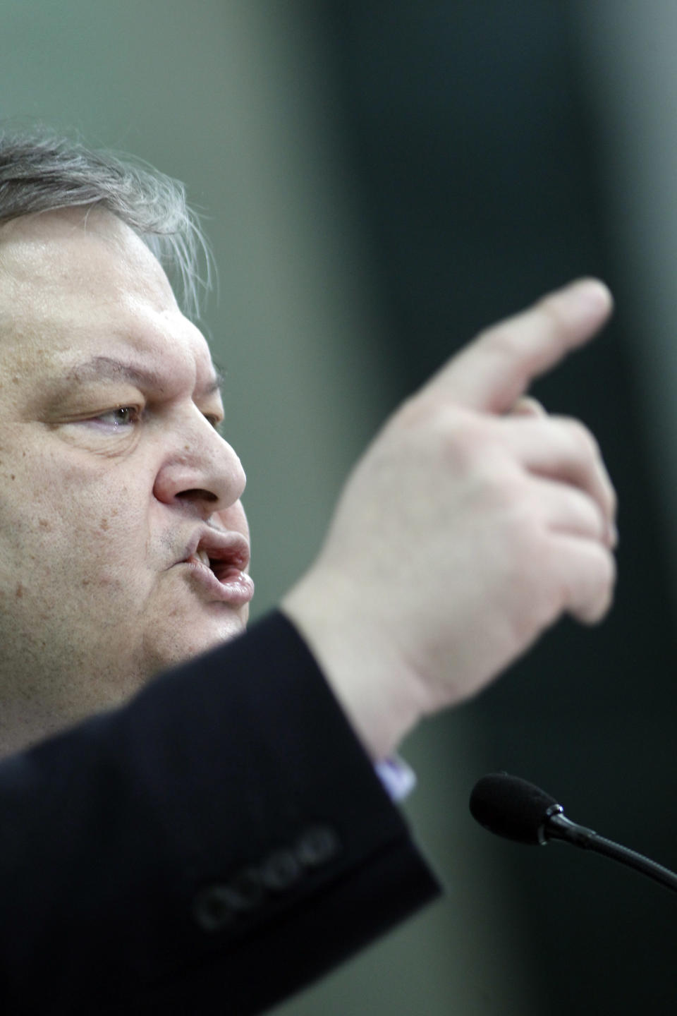 Greek Socialist Party leader Evangelos Venizelos speaks during an election campaign rally at an indoor arena near Athens,Thursday April 19 2012. Venizelos, whose party has been hammered in opinion polls ahead of May 6 general election, said a vote for anti-bailout parties could wreck the recovery effort in the crisis-hit country. (AP Photo)