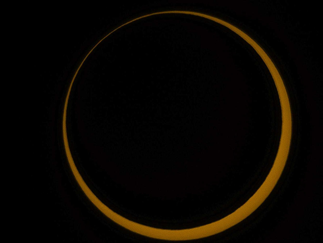  The moon blocks the sun in a ring of fire solar eclipse. 