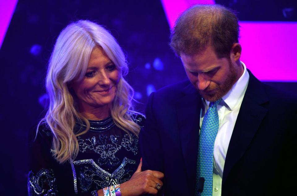 The Duke of Sussex reacts next to television presenter Gaby Roslin as he delivers a speech during the annual WellChild Awards (PA)