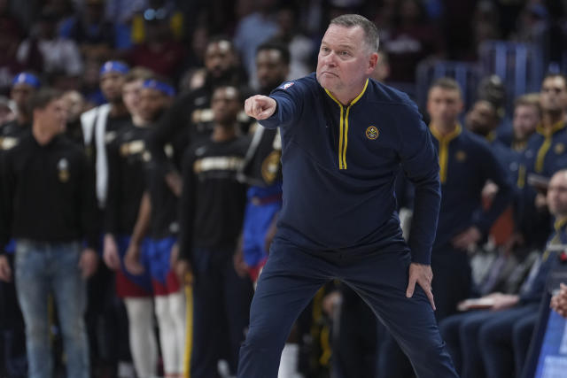 Denver Nuggets head coach Michael Malone motions to his players during the second half of Game 1 of the NBA basketball Western Conference Finals series against the Los Angeles Lakers, Tuesday, May 16, 2023, in Denver. (AP Photo/Jack Dempsey)