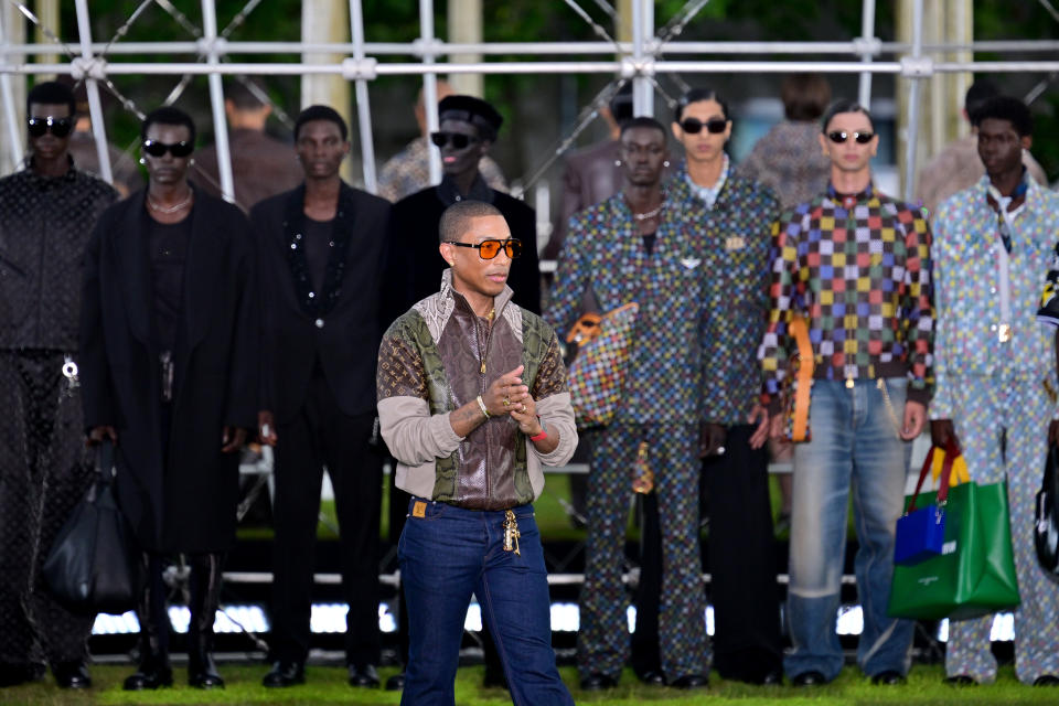 Creative director Pharrell Williams acknowledges the audience during the Louis Vuitton Menswear Spring/Summer 2025 show as part of Paris Fashion Week on June 18, 2024 in Paris, France.