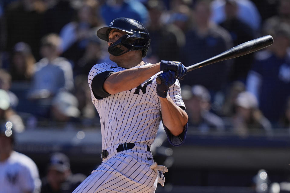 New York Yankees' Giancarlo Stanton watches a ball he hit for a grand slam during the third inning of a baseball game against the Toronto Blue Jays Sunday, April 7, 2024, in New York. (AP Photo/Frank Franklin II)