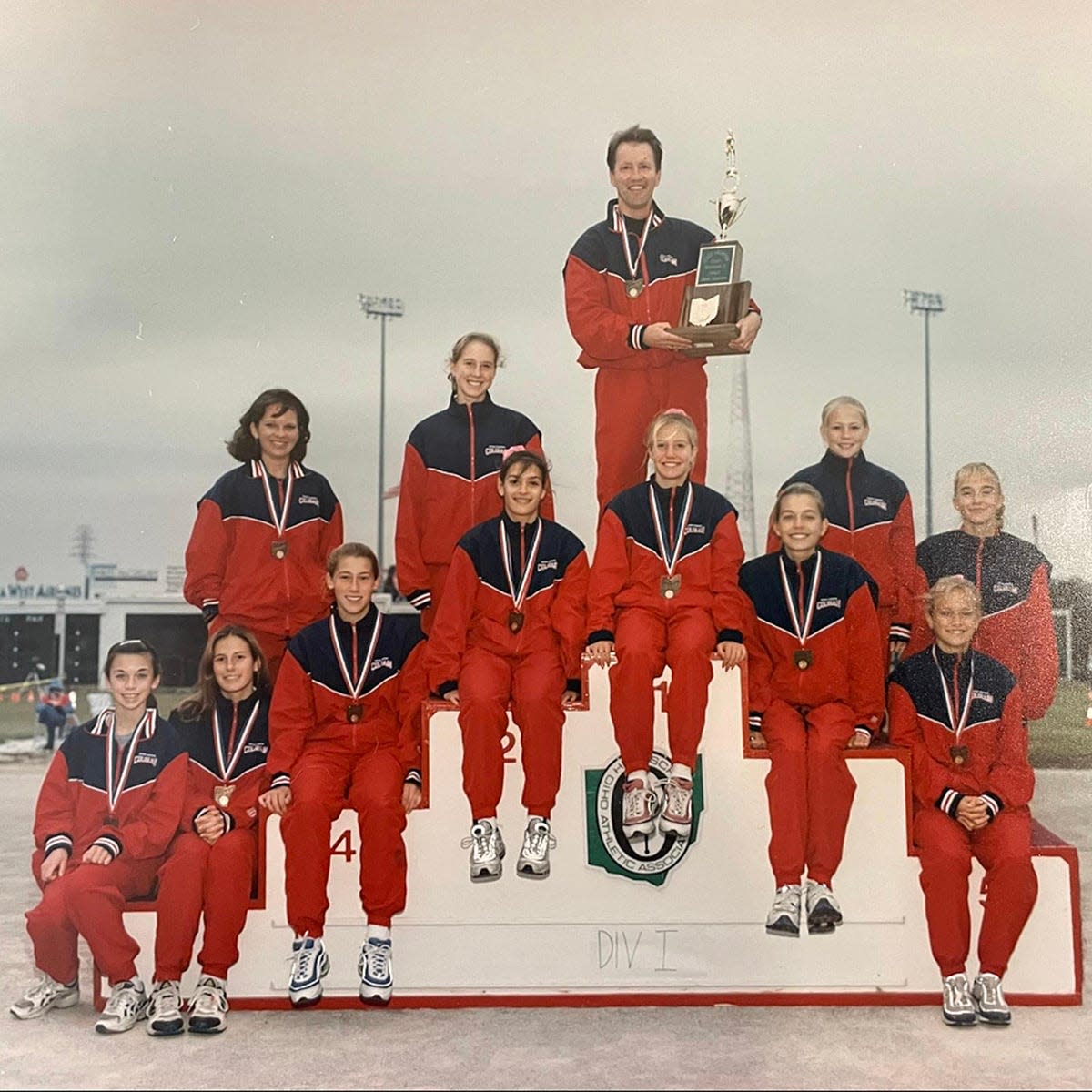 Led by head coach Ron Russo (back row, center), the 1997 Colerain girls cross country won the first of four straight state championships.