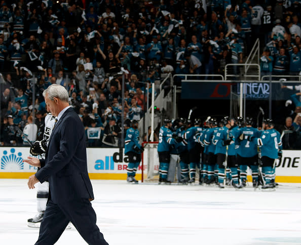 SAN JOSE, CA - APRIL 20: Head Coach Darryl Sutter of the Los Angeles Kings walks off as the San Jose Sharks celebrate on the ice after the San Jose Sharks victory during the Western Conference First Round during the 2016 NHL Stanley Cup Playoffs at the SAP Center at San Jose on April 20, 2016 in San Jose, California. (Photo by Don Smith/NHLI via Getty Images)