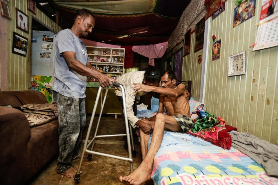 Ali Mohammed spends his days in the living room of Manimala’s house in Kampung Kuantan, Kuala Selangor. — Picture by Sayuti Zainudin 