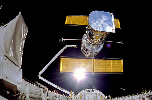 The Hubble Space Telescope was deployed by the space shuttle Discovery on April 25, 1990, one day after its launch.