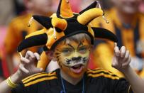 A Hull City supporter poses for a photograph before the start of his team's FA Cup final soccer match against Arsenal at Wembley Stadium in London, May 17, 2014. REUTERS/Eddie Keogh (BRITAIN - Tags: SPORT SOCCER)