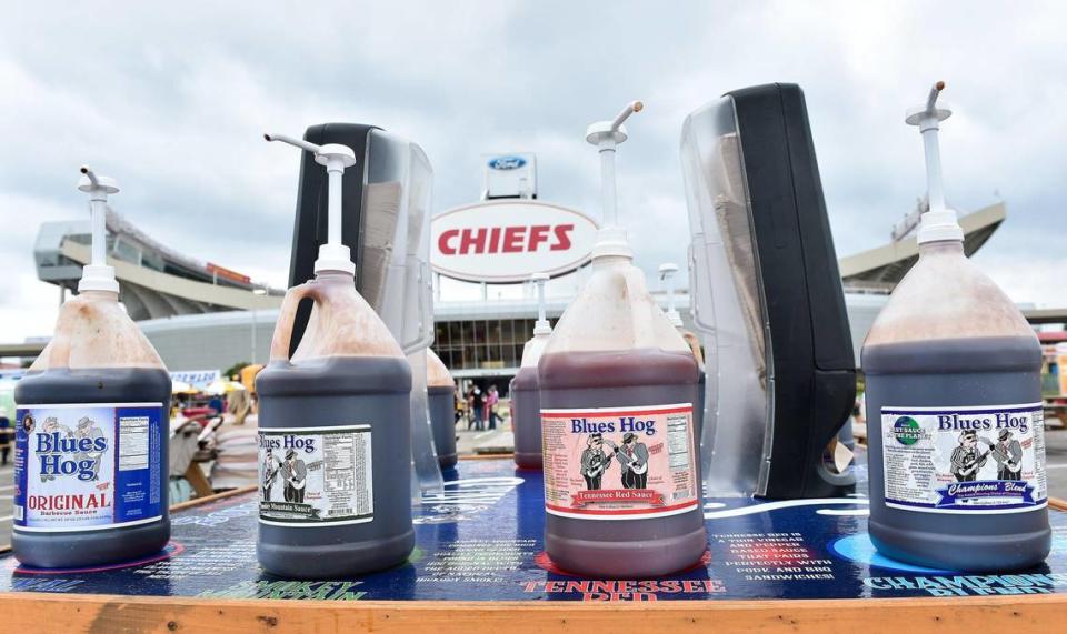 The three-day Kansas City BBQ Festival, in the parking lot of the GEHA Field at Arrowhead Stadium, concluded Sunday, July 11, 2021. Blues Hog placed sauce tables around the site.