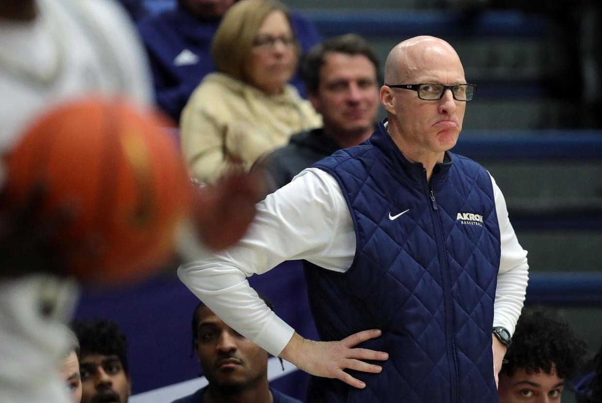 Akron Zips head coach John Groce watches from the bench during the second half against Ohio, Tuesday, Jan. 23, 2024.