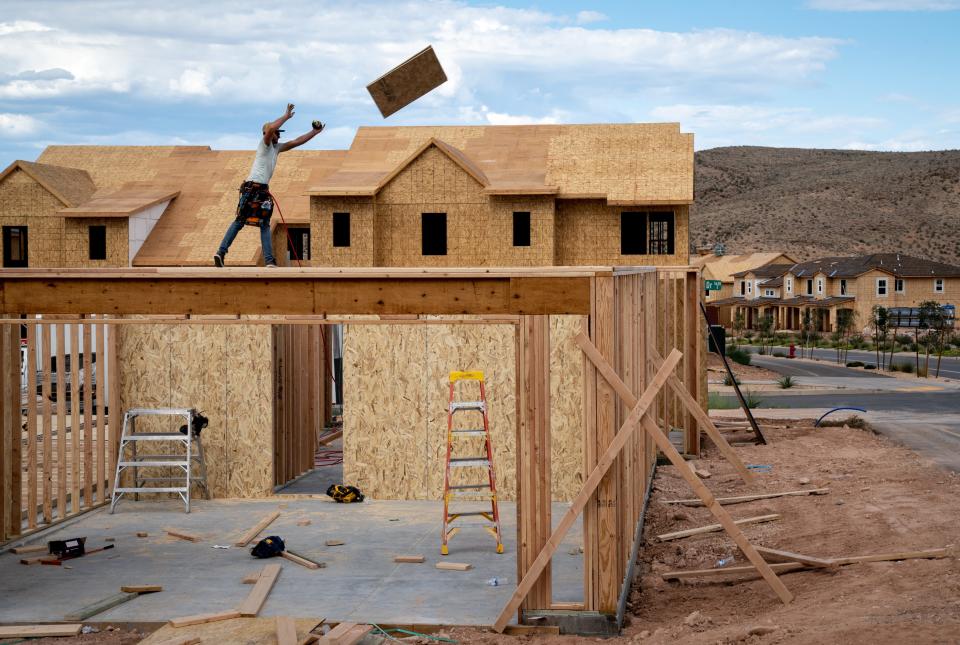 Construction continues on a home at Desert Color in St. George, Utah, on Sept. 27, 2022. The area is among the nation’s fastest growing and is in a water-challenged part of the Colorado River Basin, and uses recycled water for outdoor irrigation and ponds — an adaptation to the region’s aridification.